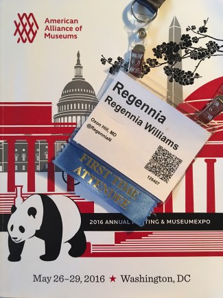 The AAM program booklet and my name badge.